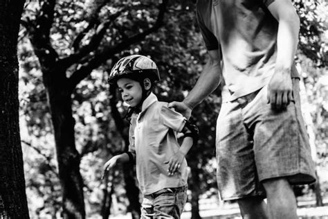 Premium Photo | Boy learning roller skating in park