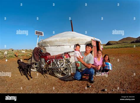 Family near Mongolian traditional dwelling yurt. Bayankhongor aimag, Mongolia Stock Photo - Alamy