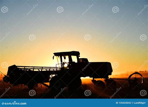 Silhouette Of Combine Harvester Royalty-Free Stock Photo | CartoonDealer.com #215198991