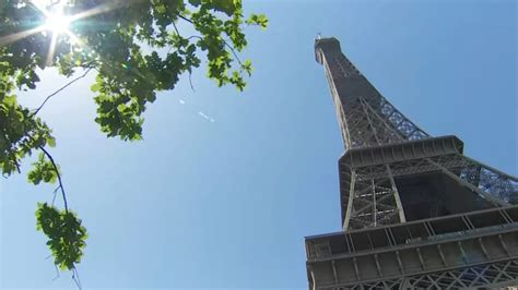 Drunk American tourists jump over security barrier, become 'trapped' overnight up Eiffel Tower ...