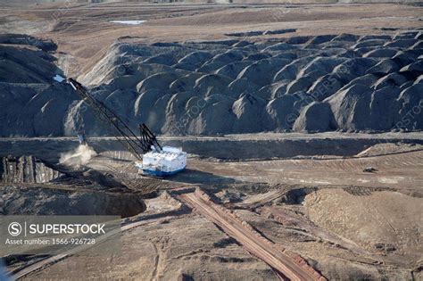 Gillette, Wyoming - A dragline excavator moves earth at a surface coal mine in Wyoming´s Powder ...