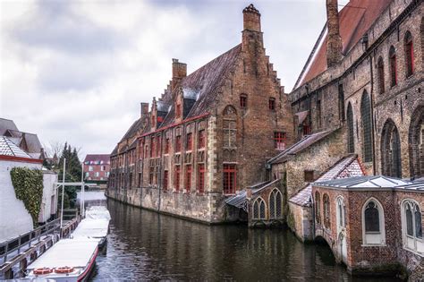 Snow Over Bruges - Snowy spring day in Bruges Canal looking over the ...