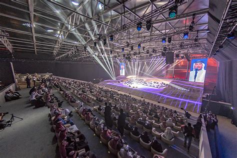 maraya concert hall appears as a giant mirrored mirage in the desert