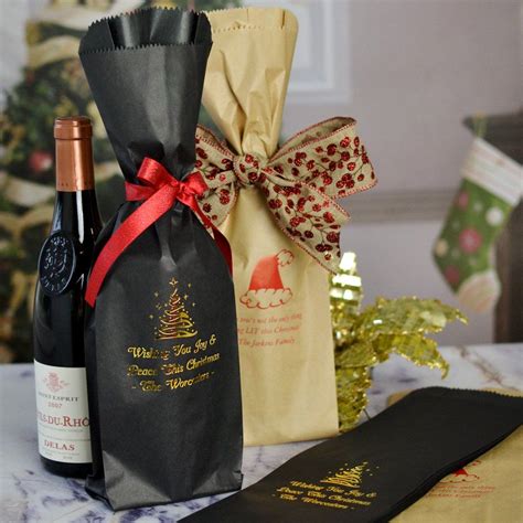 5 x 16 paper wine bottle gift bags personalized with choice of holiday design and up to 4 lines ...