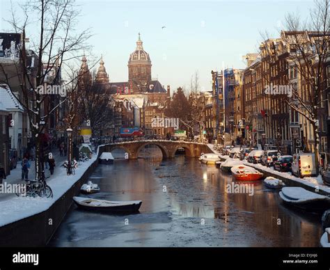 Amsterdam canal in winter Stock Photo - Alamy