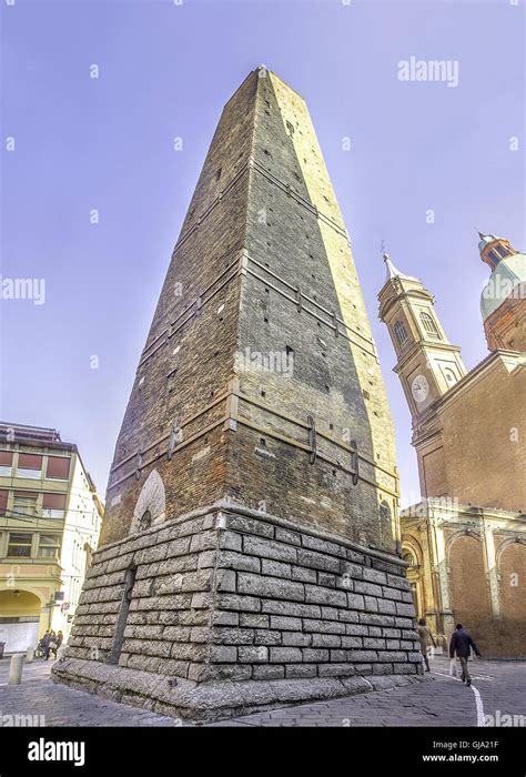 The Garisenda tower in Bologna from the street level Stock Photo - Alamy