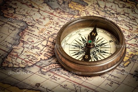 Old vintage compass on ancient map — Stock Photo © DmitryRukhlenko ...