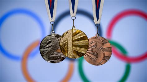 Olympic Gold Medal 2024 : Philippe Starck S Paris 2024 Olympic Medals Are Designed To Be Shared ...