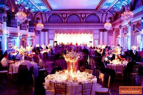 Sultry lighting transforms the Grand Ballroom for this wedding reception at The Fairmont Copley ...
