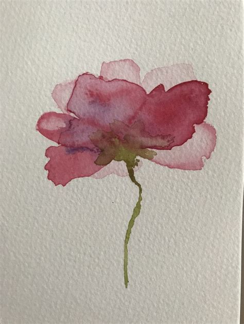 a watercolor painting of a pink flower