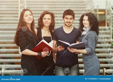 Group of Students Talking and Holding Notebooks Stock Photo - Image of casual, hispanic: 112180944