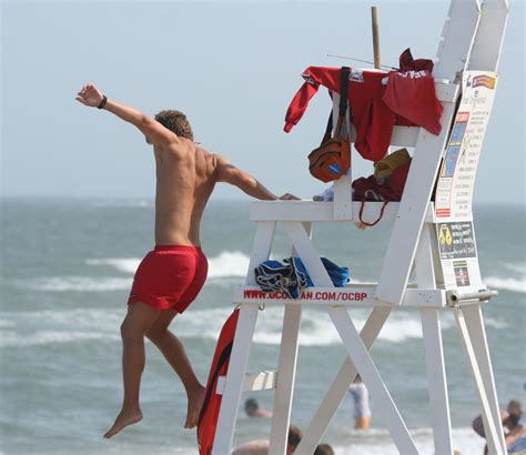 File:Lifeguard jumping into action, Ocean City, June 27 ,2007.jpg - Wikipedia