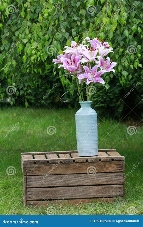 Bouquet of Lilies in the Garden Stock Photo - Image of beauty, flora: 169106950