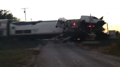 Dramatic video shows Amtrak train slamming into semi-truck car hauler - ABC News