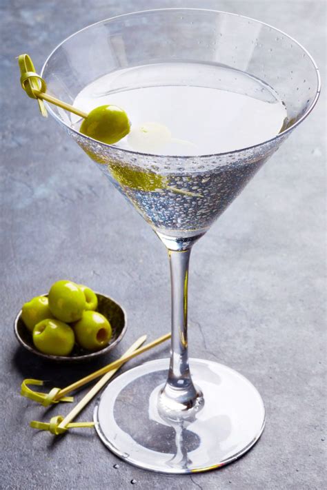 The classic dry Gin Martini contains just three simple ingredients - gin, vermouth, and either a ...