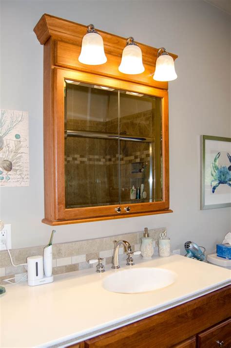 Individual Medicine Cabinet with Overhead Lights on a double vanity ...