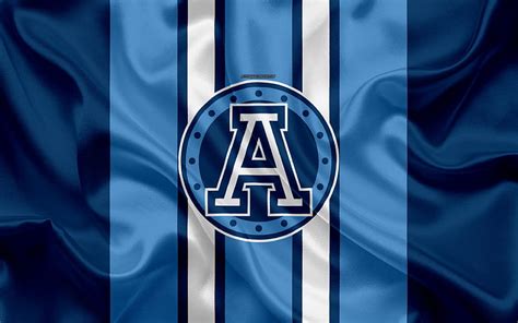 Toronto Argonauts logo, silk texture, Canadian football team, CFL, emblem, blue white silk flag ...