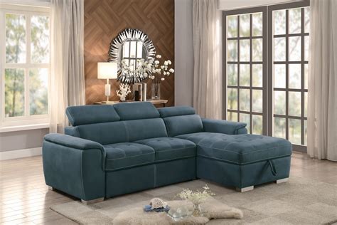 a living room with a blue sectional couch