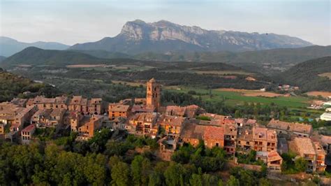 Ainsa, Spain. Flying Over Ainsa Village in Aragon Mountains. Aerial View, FHD, Stock Footage