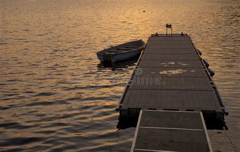 Jetty sunset boat stock photo. Image of sunset, boat - 25052384