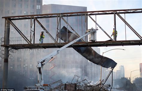 LA fire closes two freeways as firefighters battle to get it under ...