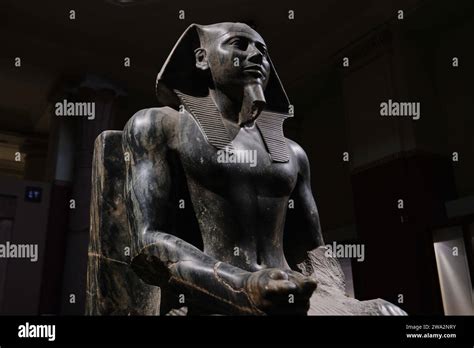 Cairo, Egypt - January 2, 2024: Statue of pharaoh khafre enthroned in the egyptian museum in ...