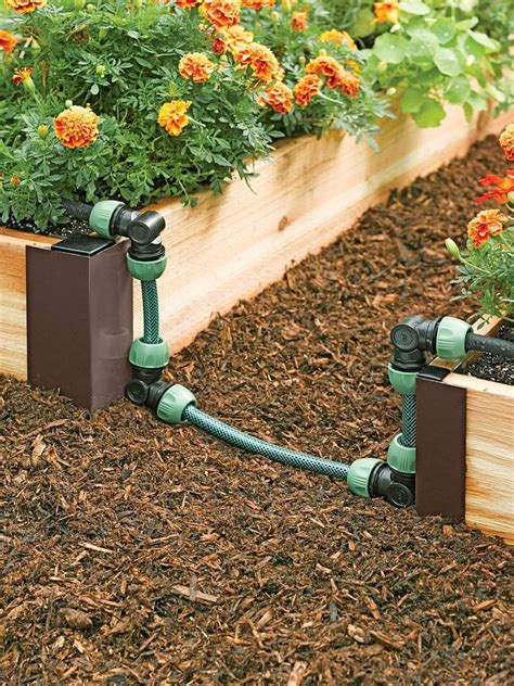 Installing Self Watering Raised Garden Bed Corners | Watering raised garden beds, Garden ...