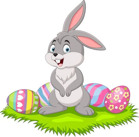 Premium Vector | Cute little bunny with easter egg in the grass