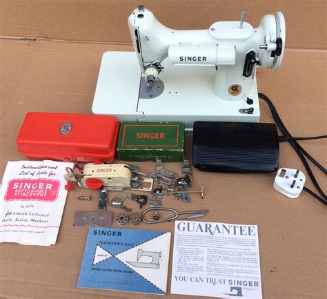 white 221K Singer Featherweight Vintage Sewing Machine with buttonhole attachment, accessories ...