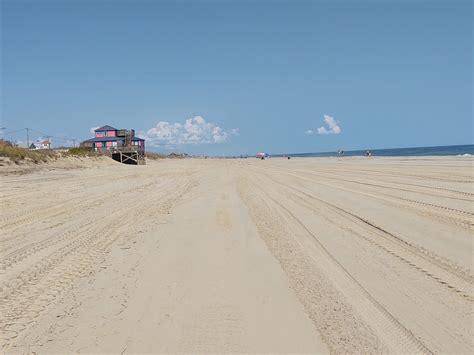 Southern half of Kitty Hawk beach nourishment done, work likely to pause for Fiona's waves ...