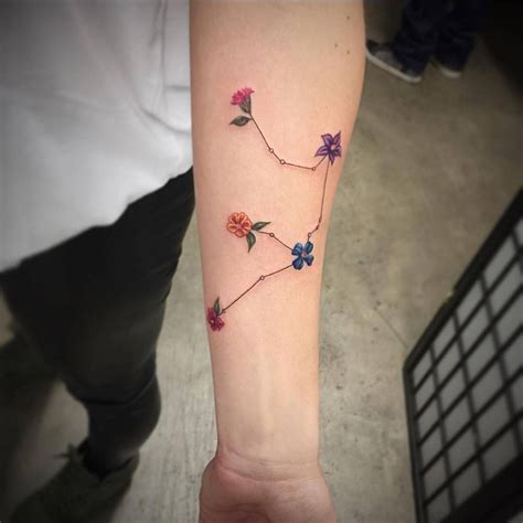 Floral Aquarius tattoo on the left inner forearm.... - Small Tattoos for Men and Women ...