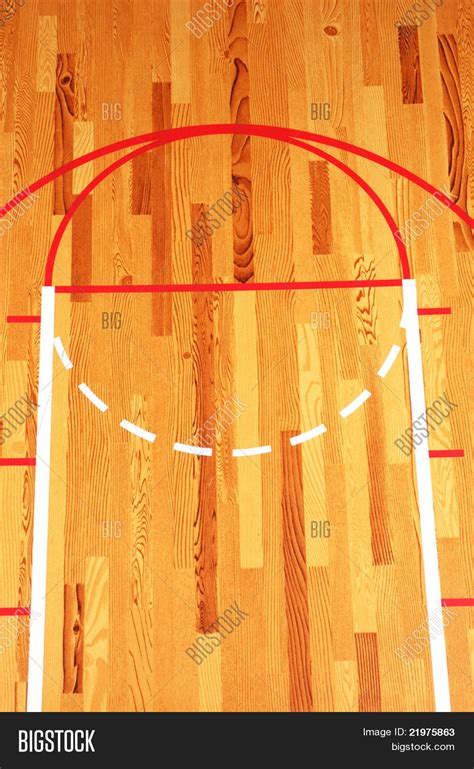 Basketball Key painted on hardwood floor in gymnasium Stock Photo ...