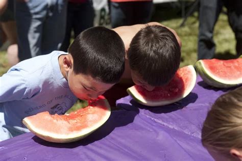 Watermelon eating contest Stock Photos, Royalty Free Watermelon eating ...