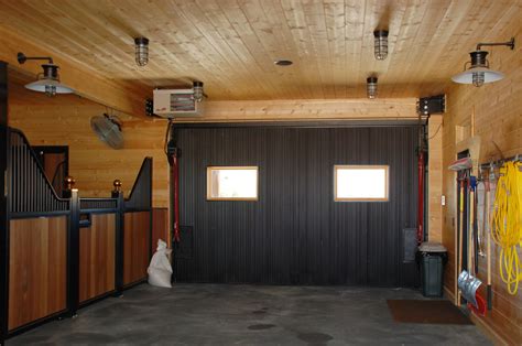 Black corrugated metal on the inside of the garage door amps up the design in this space ...