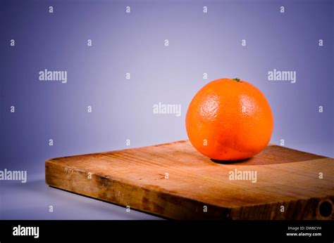 One orange fruit Stock Photo - Alamy