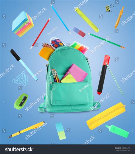 Backpack Surrounded By Flying School Stationery Stock Photo 1899356497 ...