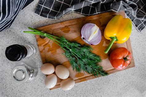 A Fresh Vegetables on a Wooden Chopping Board · Free Stock Photo