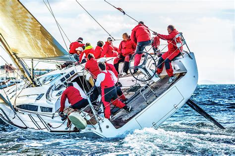 Sailing Crew On Sailboat During Regatta Photograph by Mbbirdy