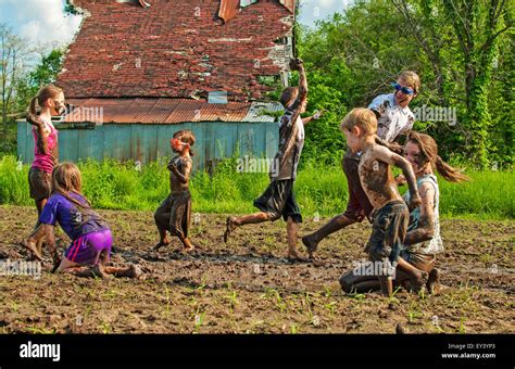 Kids playing mud fight Stock Photo, Royalty Free Image: 85524827 - Alamy