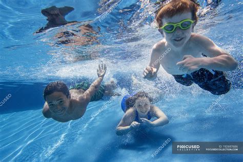 Child Swimming Underwater