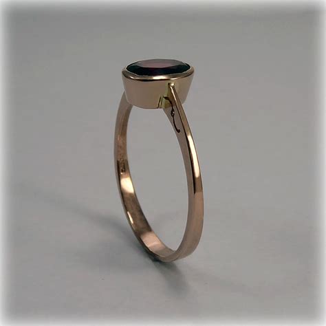 9ct Rose Gold oval Garnet Ring | Mr Allan Jewellers