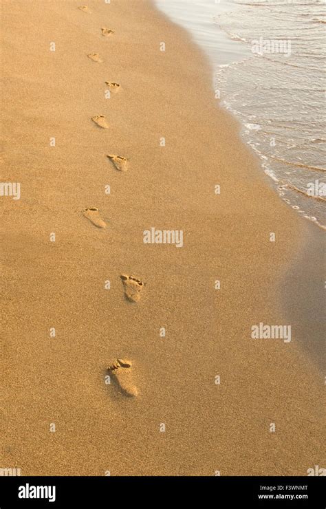 print of feet the sand Stock Photo - Alamy