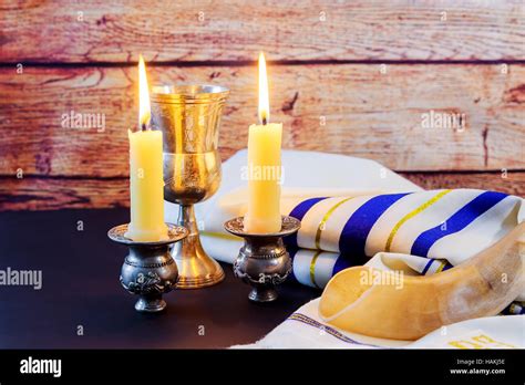 Shabbat candles in glass Jewish holiday Sabbath Prayer Shawl Tallit and Shofar horn jewish ...