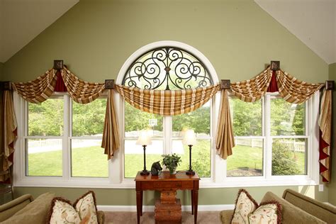 Sunroom Window Treatments with swags, jabots and faux iron | Traditional family room, Sunroom ...