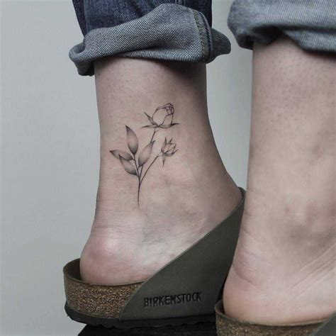 Hand-poked rose tattoo on the inner ankle - Tattoogrid.net