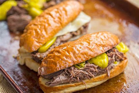 Easy Italian Beef served in hoagie rolls for the perfect sandwich your ...