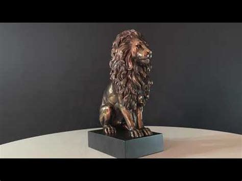 Sitting Lion Statue - YouTube