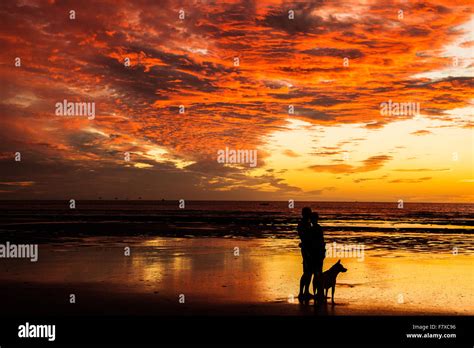 Silhouette Beach Sunset Stock Photo - Alamy