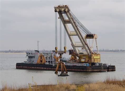 Dredger ship on the river stock image. Image of beach - 63129809