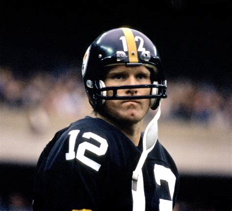 Quarterback Terry Bradshaw Of The Pittsburgh Steelers Looks On From 32E